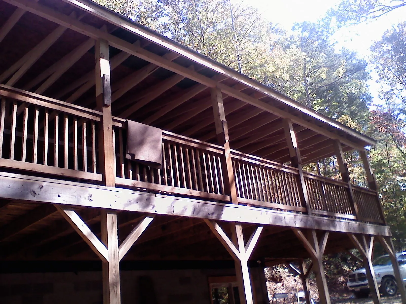 Timber framing under a new elevated porch and deck — Roof Leak Repair in Lincoln Park by Roofing Brothers